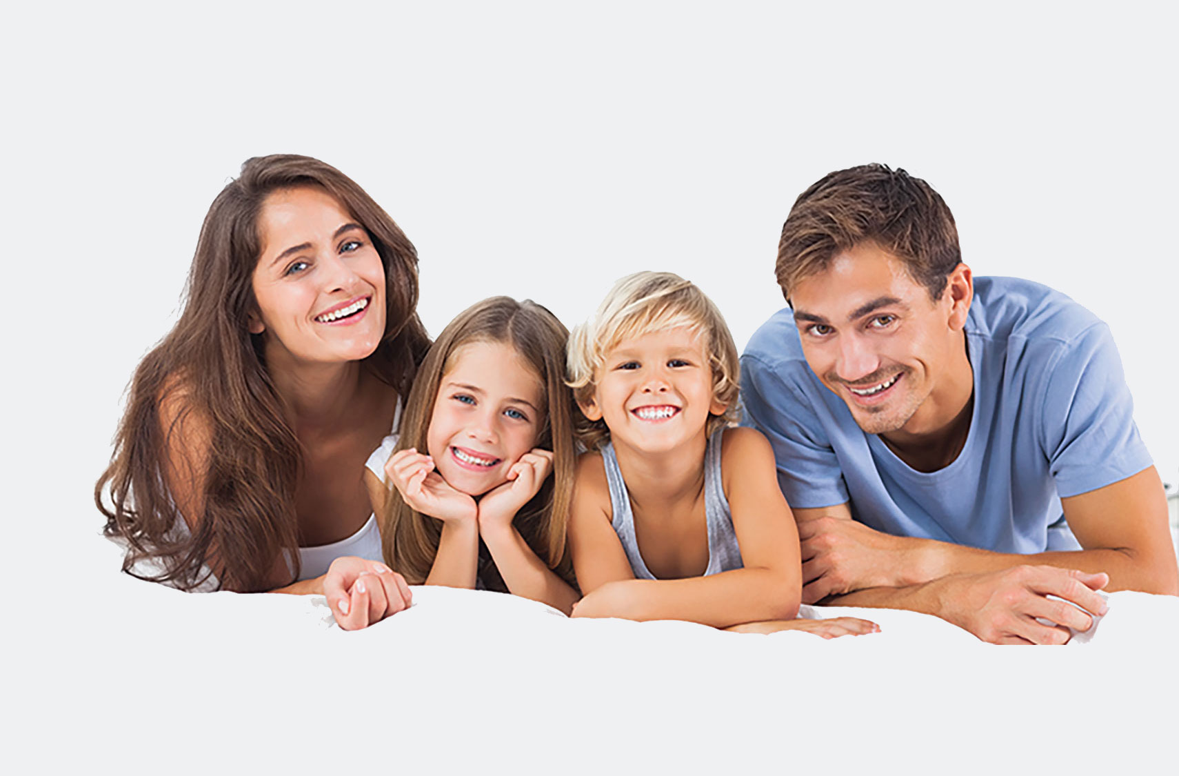 A happy family lying down together.