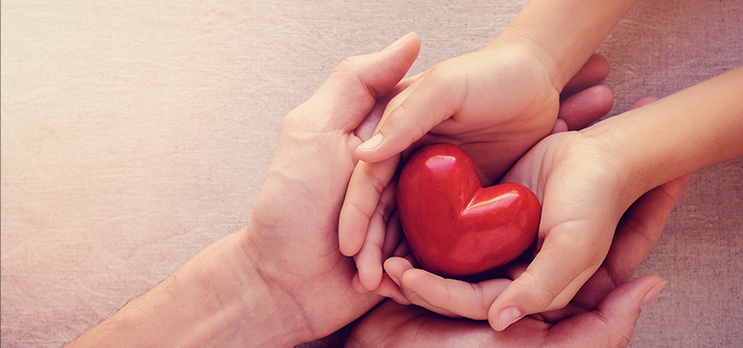 Adult child red heart.