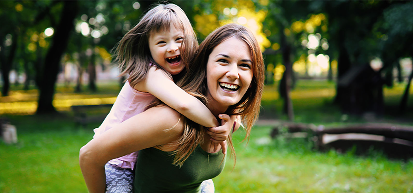 Mother and child with special needs at the park.