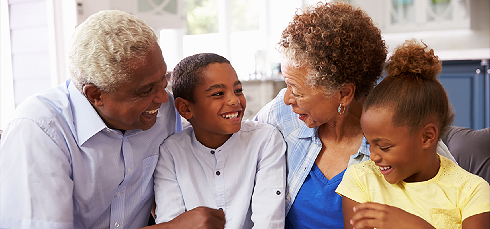 Grandparents with their young grandchildren.