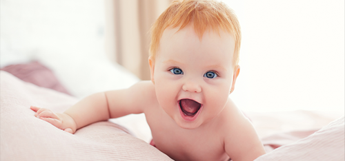 Baby with bright red hair